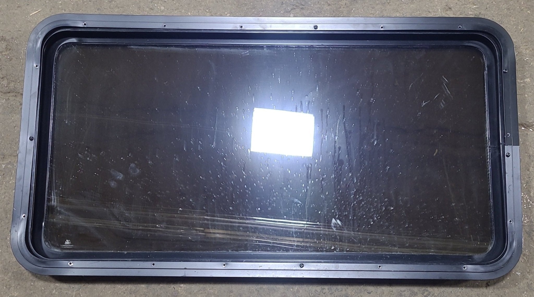 Used Black Radius Non Opening Window : 42 1/8" W x 21 1/2" H x 1 7/8" D - Young Farts RV Parts