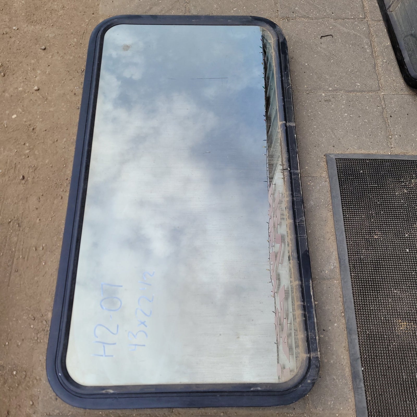 Used Black Radius Non- Opening Window : 43 X 22 1/2 X 2 1/2