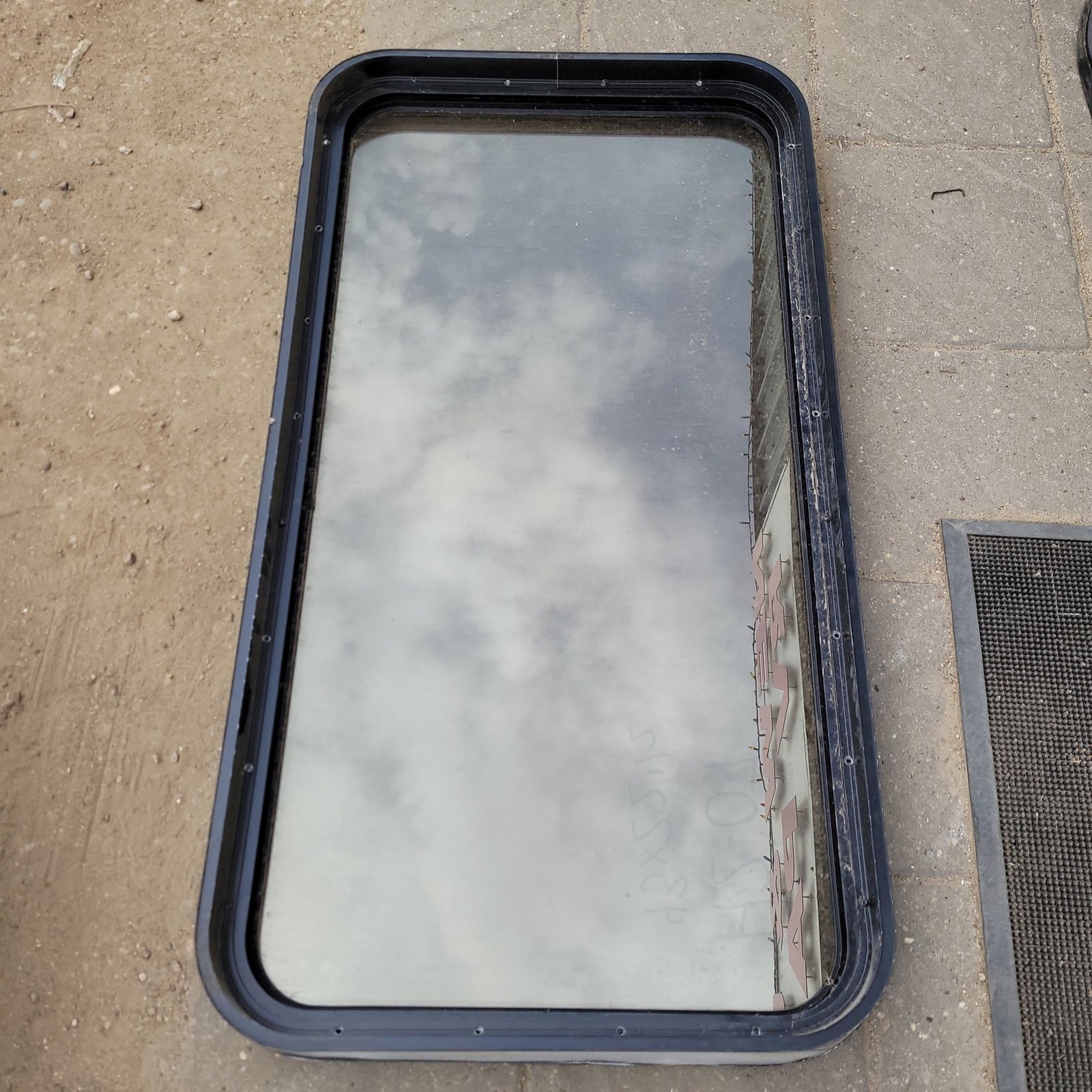 Used Black Radius Non- Opening Window : 43 X 22 1/2 X 2 1/2