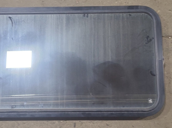 Used Black Radius Non Opening Window : 60 1/2" W x 21 3/4" H x 1 7/8" D - Young Farts RV Parts