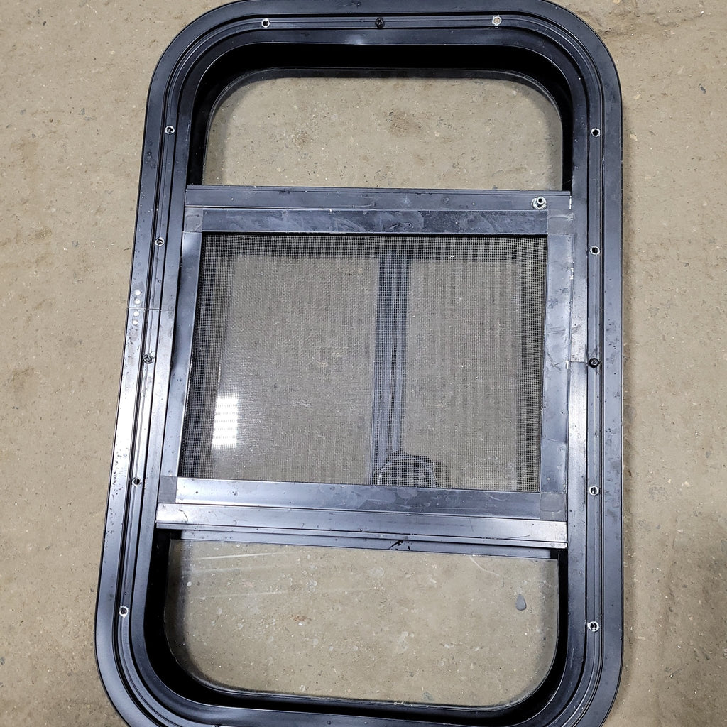 Used Black Radius Opening Window : 14 3/4" W X 23 3/4" H X 2" D - Young Farts RV Parts