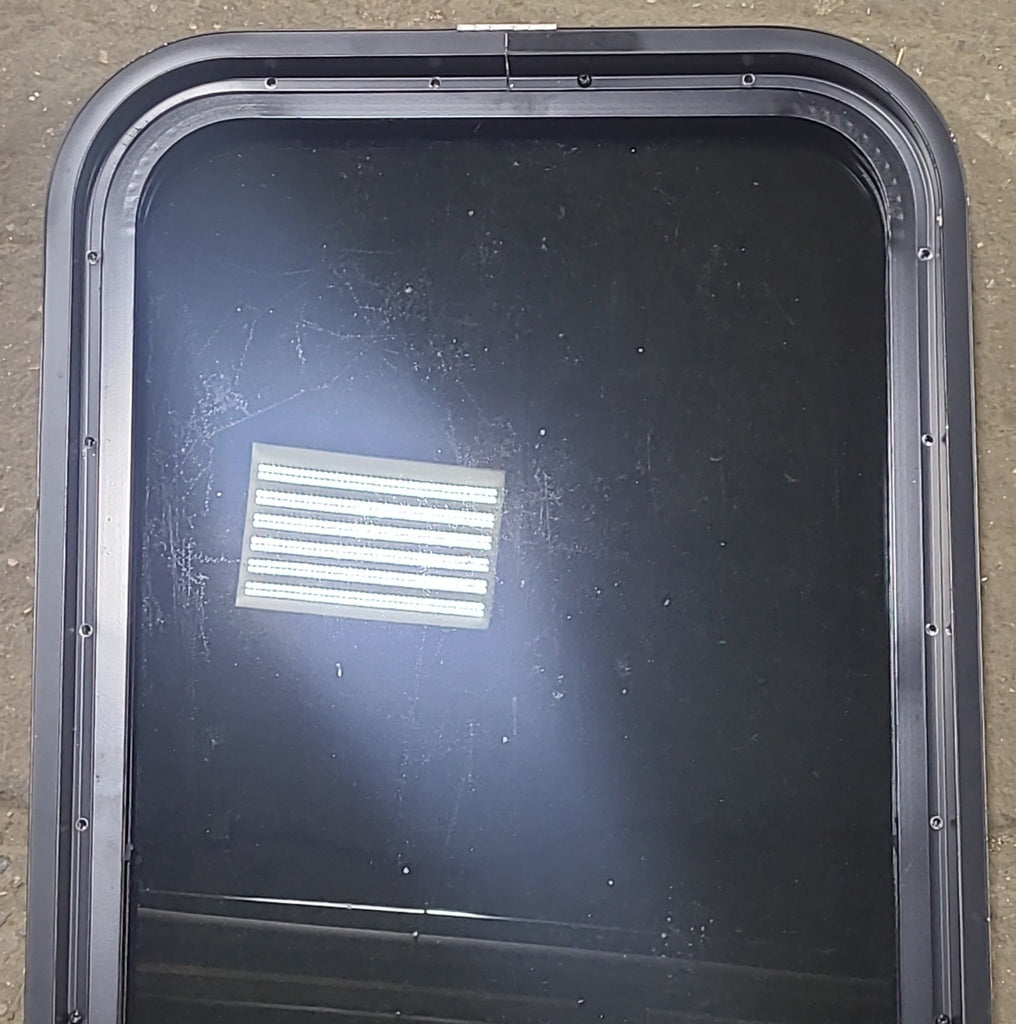 Used Black Radius Opening Window : 17 1/2" W x 35 1/2" H x 2" D - Young Farts RV Parts