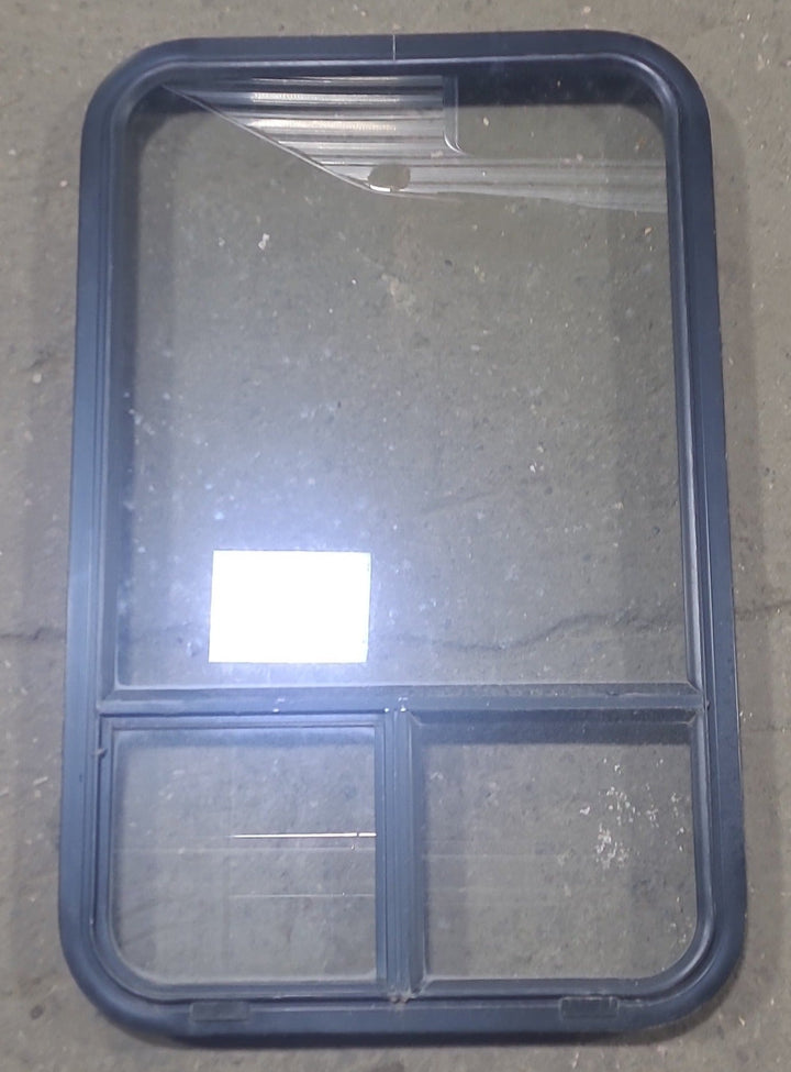 Used Black Radius Opening Window : 22 1/2" W x 35 3/4" H x 1 3/4" D - Young Farts RV Parts