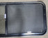 Used Black Radius Opening Window : 22" X 54 1/2" X 2" D - Young Farts RV Parts