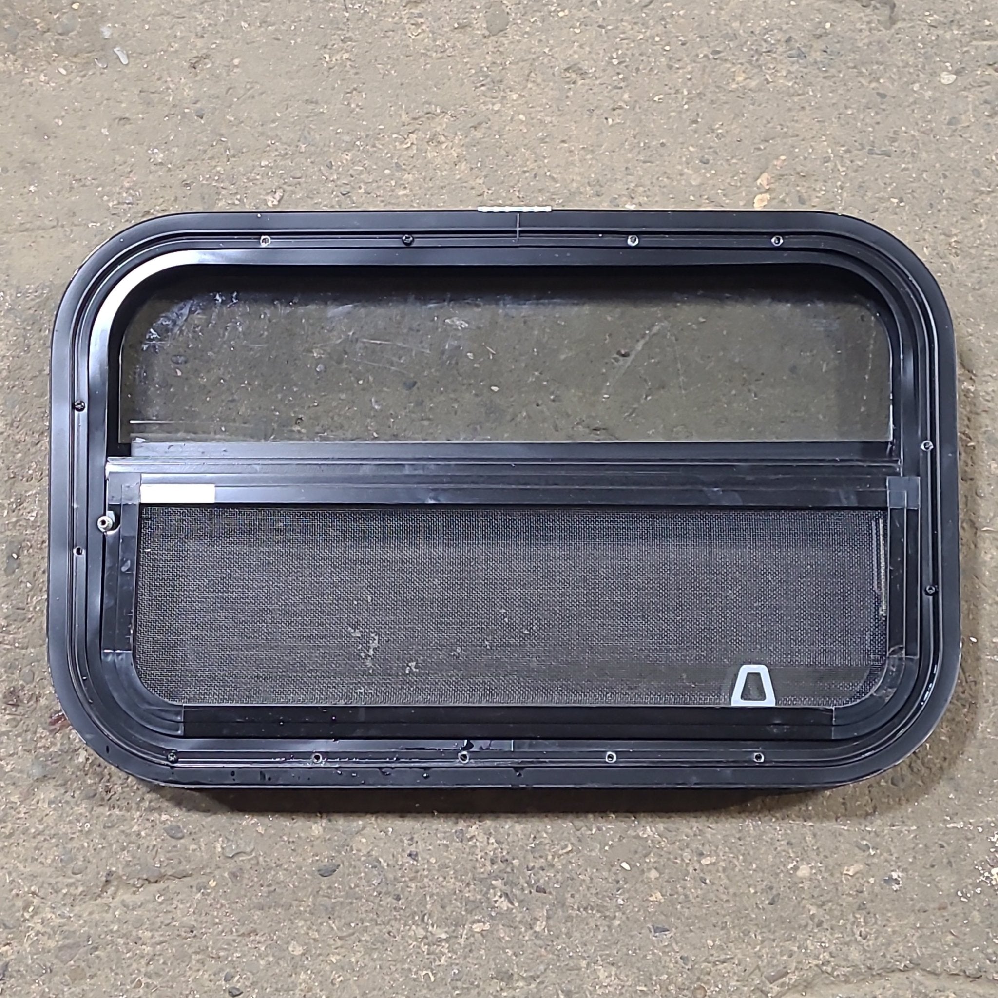 Used Black Radius Opening Window : 23 1/2" W x 14 1/2" H x 1 3/4" D - Young Farts RV Parts