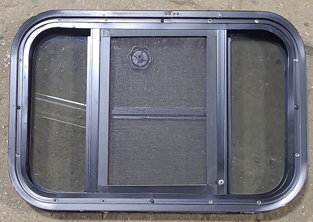 Used Black Radius Opening Window : 23 3/8" W x 15 1/2" H x 1 7/8" D - Young Farts RV Parts