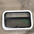USED Black Radius Opening Window : 23" W X 14 1/4" H X 1 3/4" D - Young Farts RV Parts