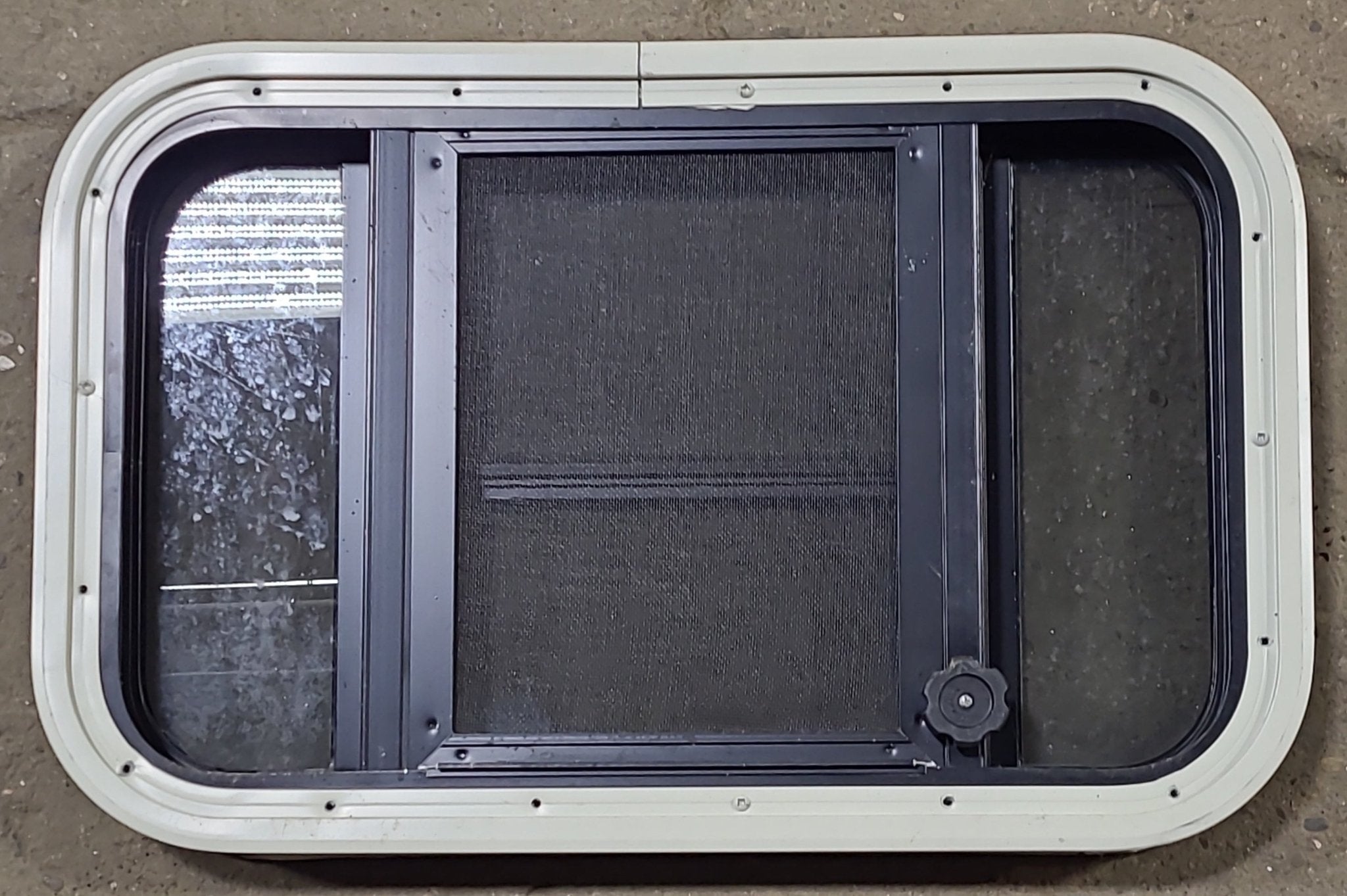 Used Black Radius Opening Window : 23" W x 14 1/8" H x 1 3/4" D - Young Farts RV Parts