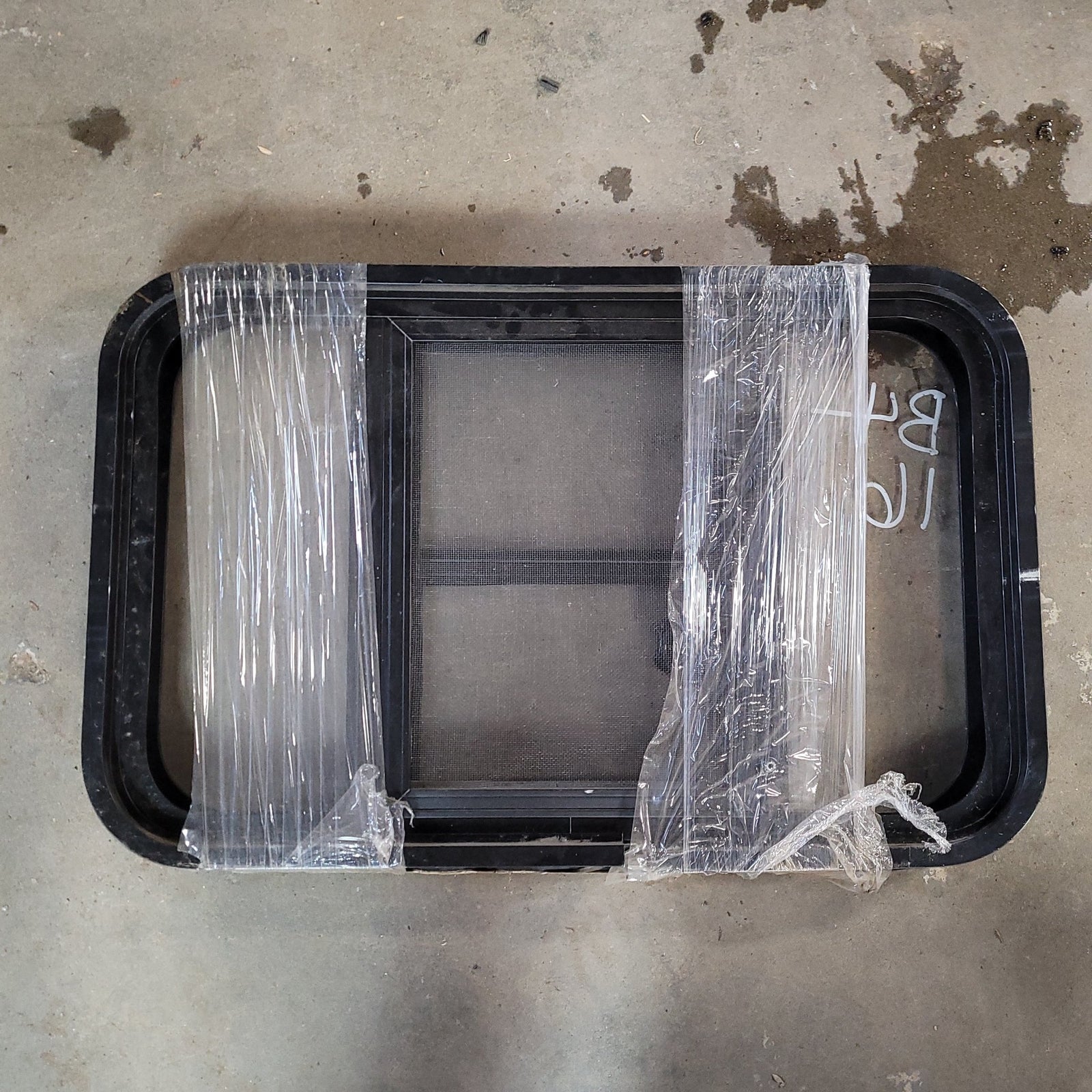 Used Black Radius Opening Window : 24 1/2 X 15 1/2 X 2