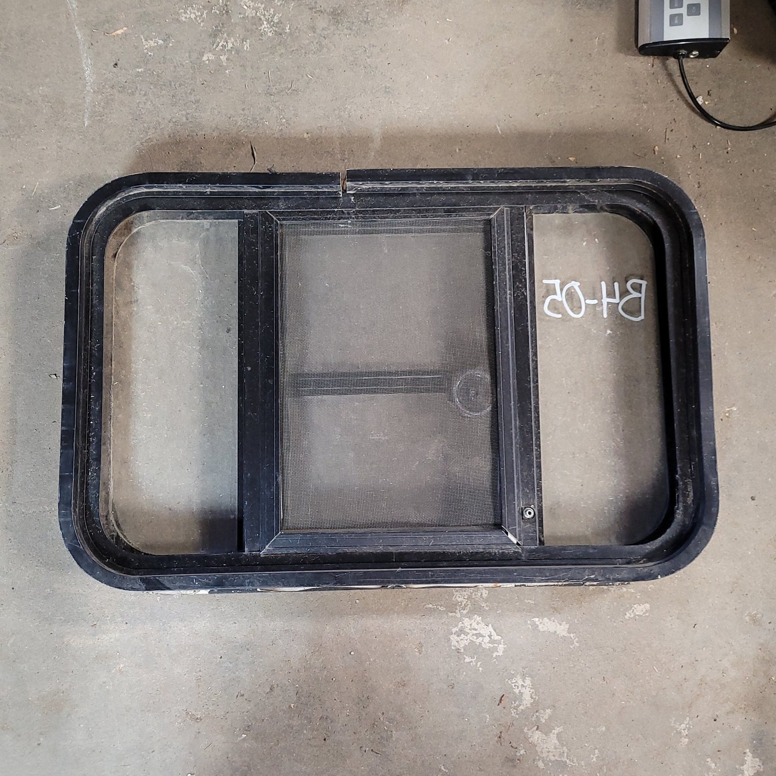 Used Black Radius Opening Window : 24 1/2 X 15 1/2 X 2