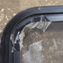 Used Black Radius Opening Window : 24 1/4" W x 35 1/4" H x 1 1/4" D - Young Farts RV Parts