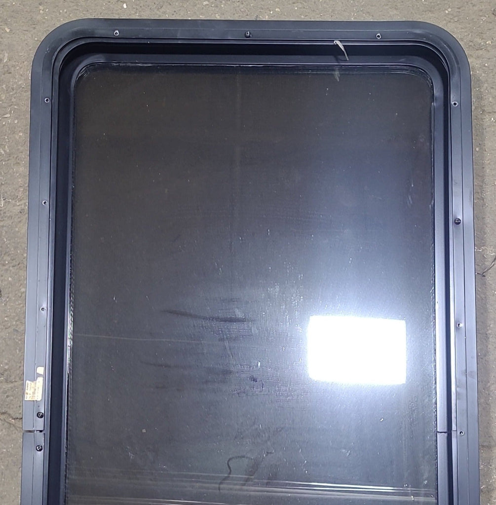 Used Black Radius Opening Window : 24 1/4" W x 47 1/2" H x 1 7/8" D - Young Farts RV Parts