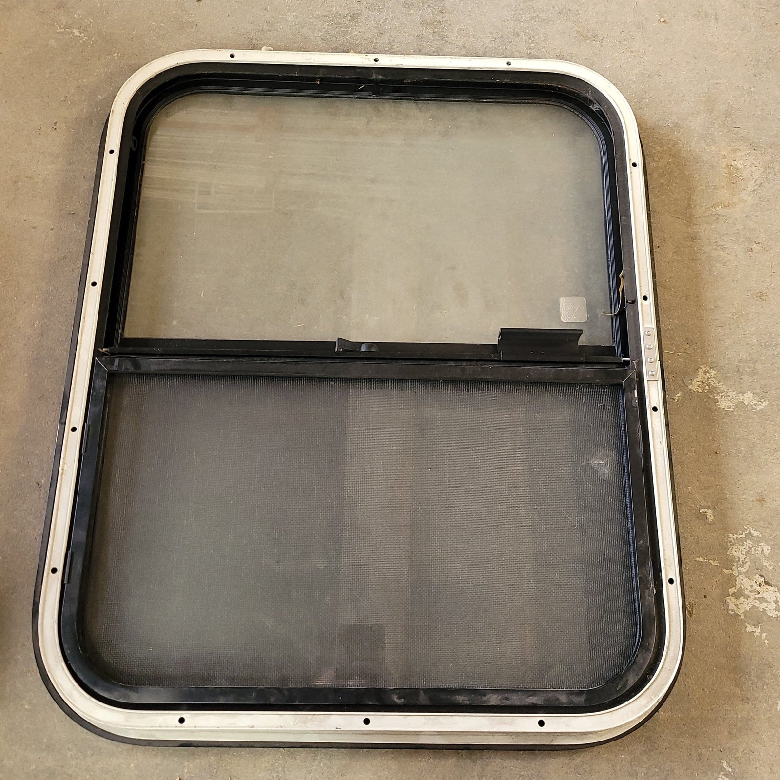 Used Black Radius Opening Window : 24 1/4 X 19 3/4 X 2