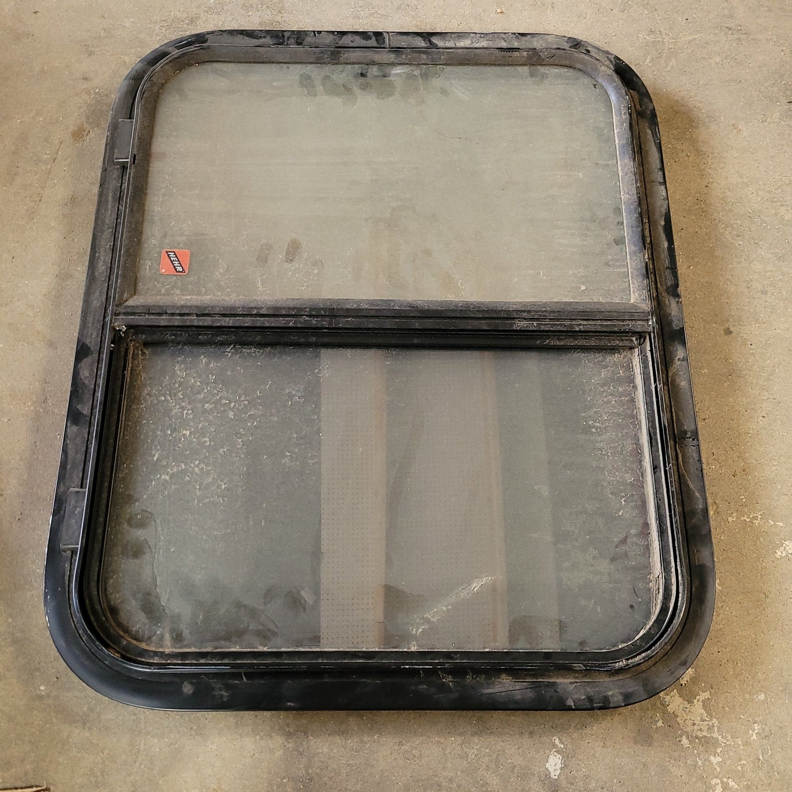 Used Black Radius Opening Window : 24 1/4 X 19 3/4 X 2