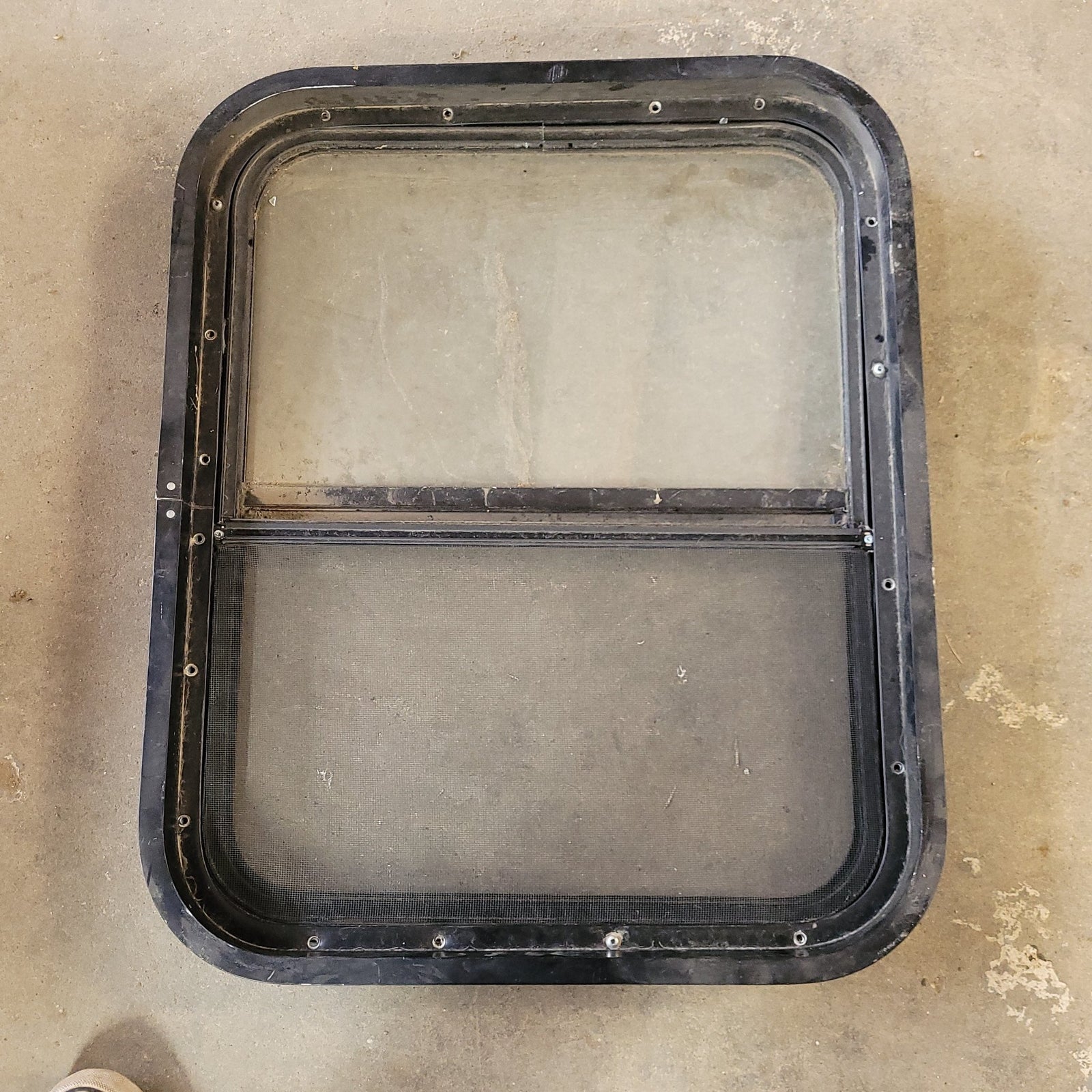 Used Black Radius Opening Window : 24 1/4 X 19 3/4 X 2