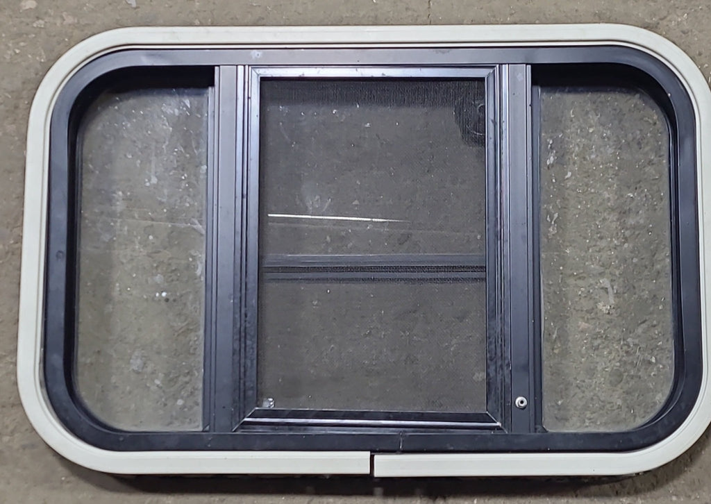 Used Black Radius Opening Window : 24 3/4" W x 16" H x 1 5/8" D - Young Farts RV Parts