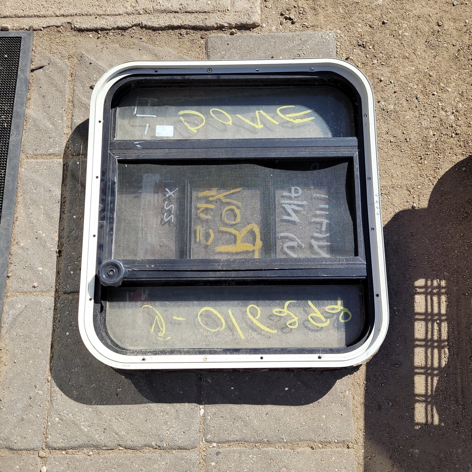 Used Black Radius Opening Window : 24 X 22 X 2