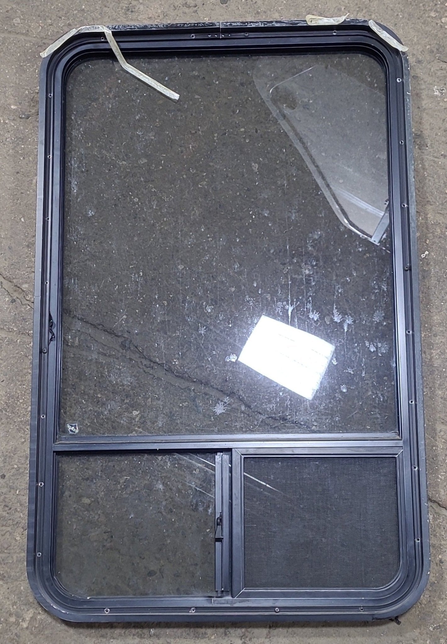 Used Black Radius Opening Window : 25 3/4" W x 41 3/4" H x 1 7/8" D - Young Farts RV Parts