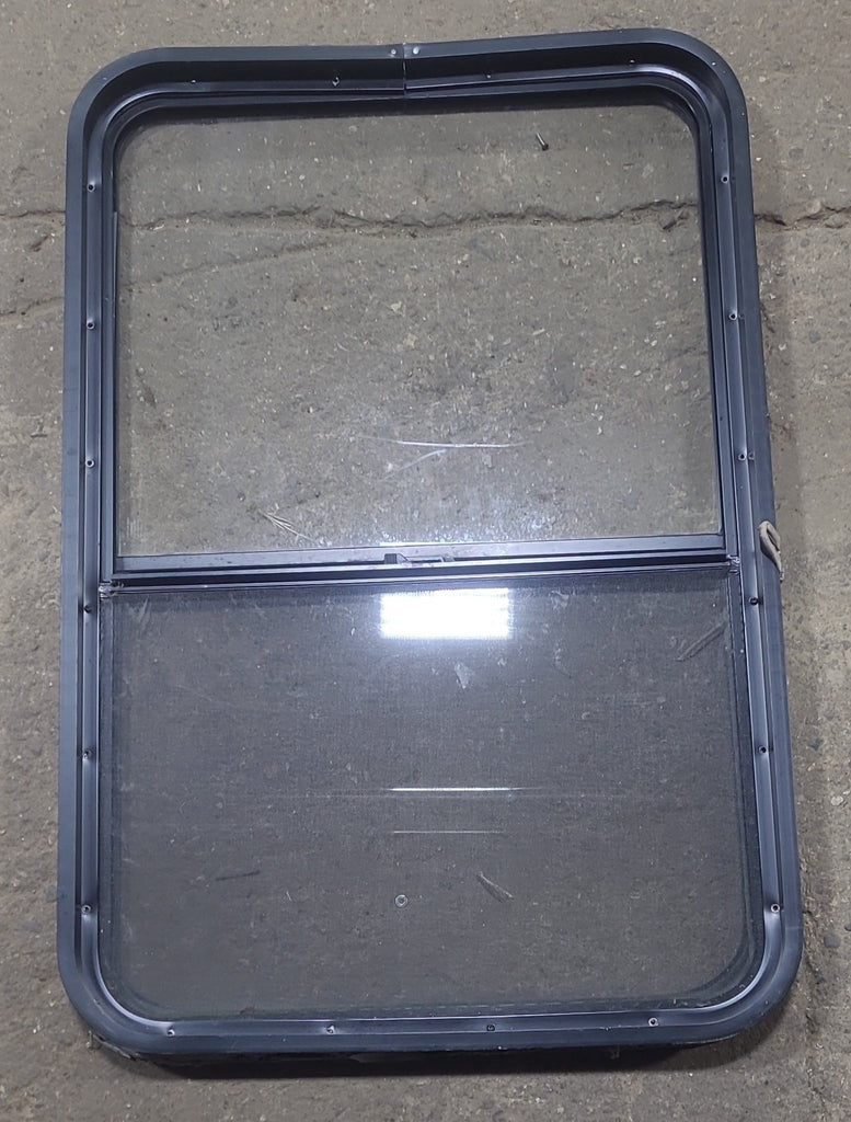 Used Black Radius Opening Window : 26 1/2" W x 39 3/4" H x 1 7/8" D - Young Farts RV Parts