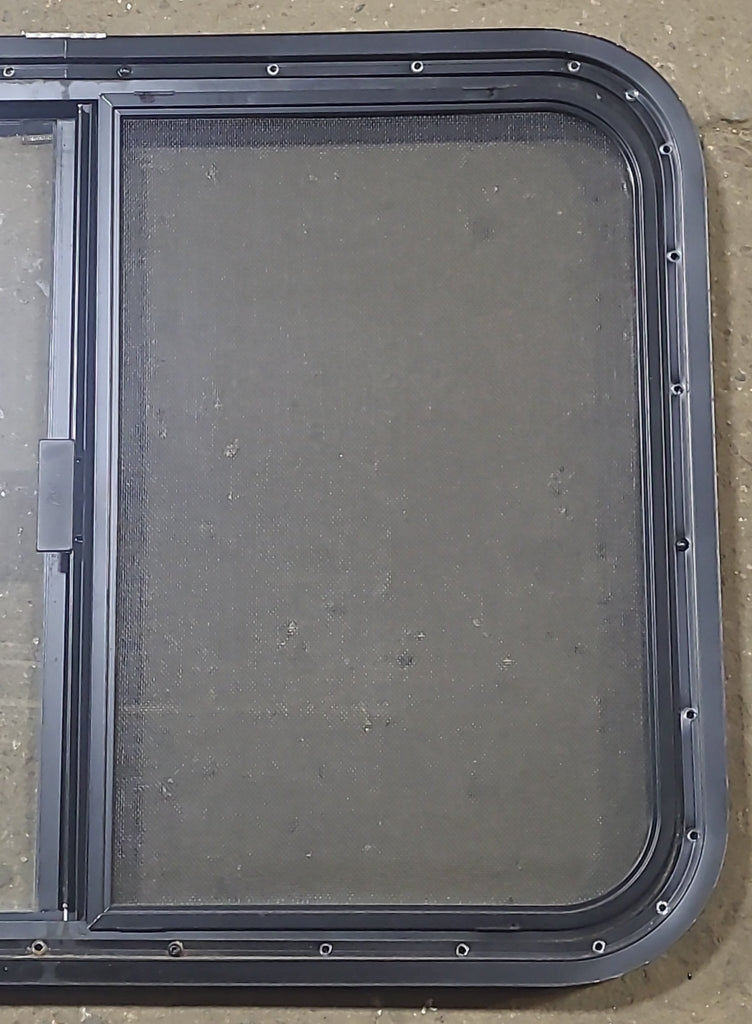 Used Black Radius Opening Window : 29 1/2" W x 21 1/2" H x 1 1/8" D - Young Farts RV Parts