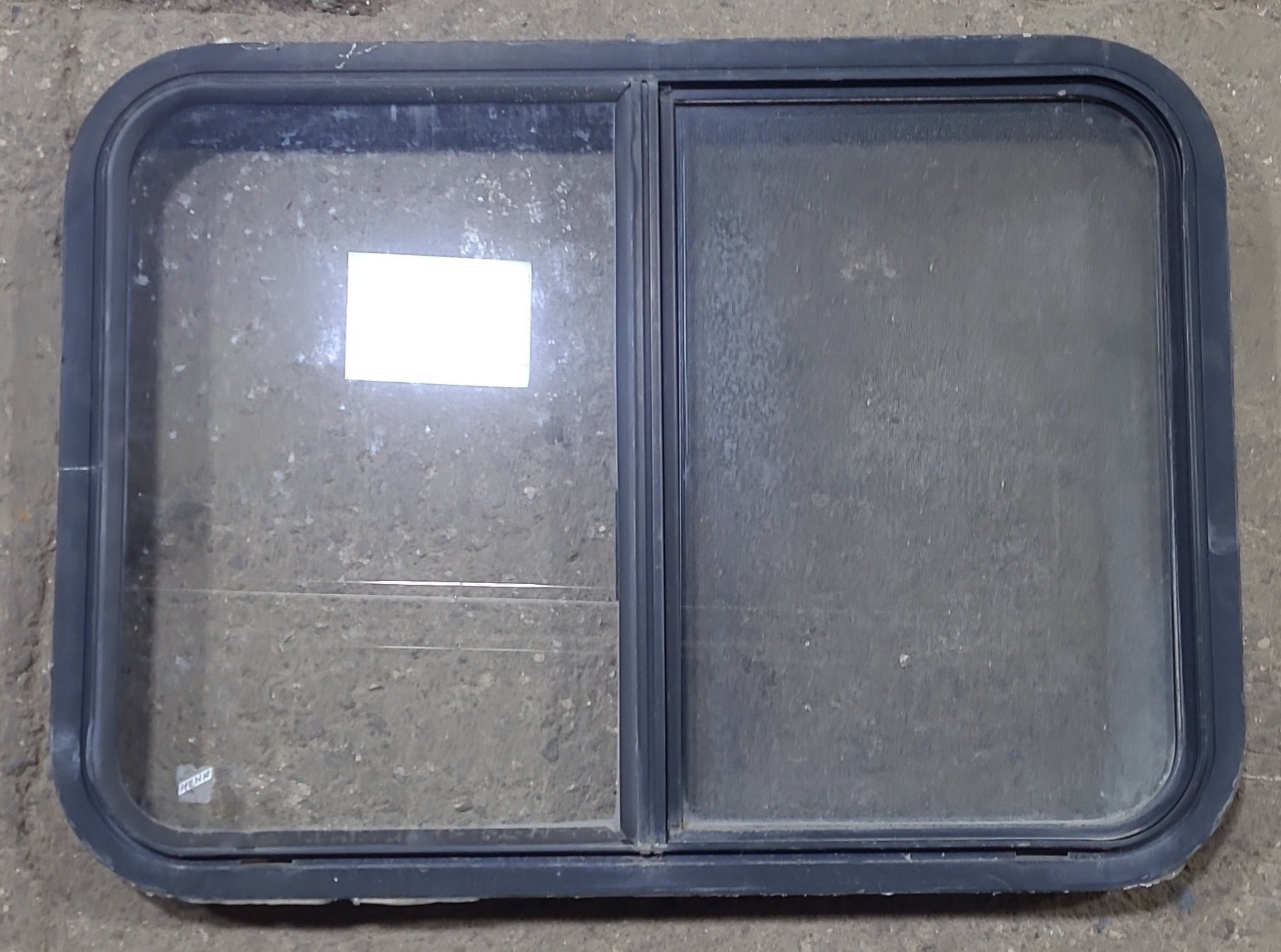 Used Black Radius Opening Window : 30 1/4" W x 22" H x 2" D - Young Farts RV Parts