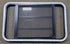 Used Black Radius Opening Window : 35 3/8" W x 21 3/8" H x 1 3/4" D - Young Farts RV Parts