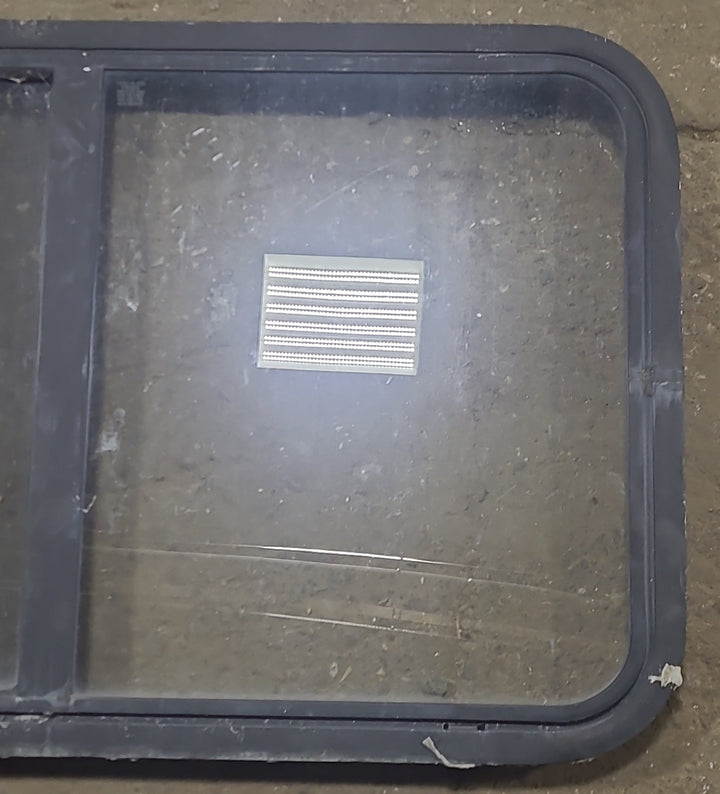 Used Black Radius Opening Window : 36 1/4" W x 21 3/4" H x 1 7/8" D - Young Farts RV Parts