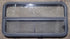 Used Black Radius Opening Window : 41 1/2" W x 21 1/4" H x 1 3/4" D - Young Farts RV Parts