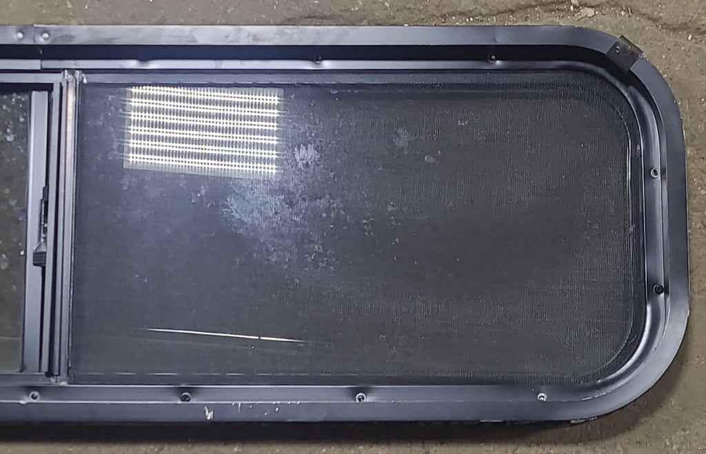 Used Black Radius Opening Window : 42 1/4" W x 11 3/4" H x 1 7/8" D - Young Farts RV Parts