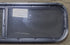 Used Black Radius Opening Window : 42 1/4" W x 11 3/4" H x 1 7/8" D - Young Farts RV Parts