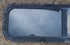 Used Black Radius Opening Window : 42 1/4" W x 11 3/4" H x 1 7/8" D - Young Farts RV Parts