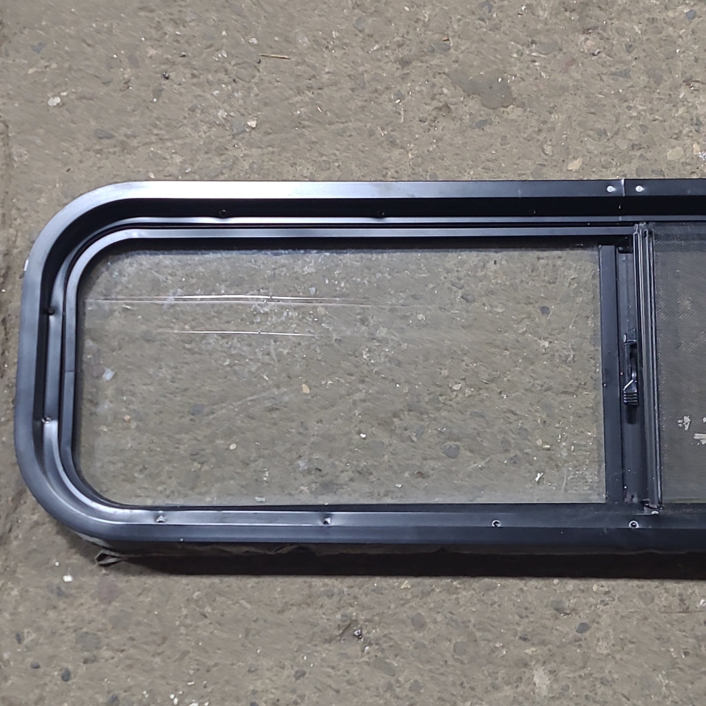 Used Black Radius Opening Window : 42 1/4" W x 11 3/4" H x 1 7/8" D - Young Farts RV Parts