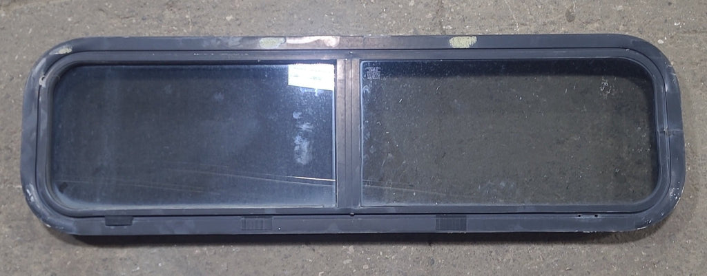 Used Black Radius Opening Window : 42 1/4" W x 11 3/4" H x 1 7/8" D - Young Farts RV Parts