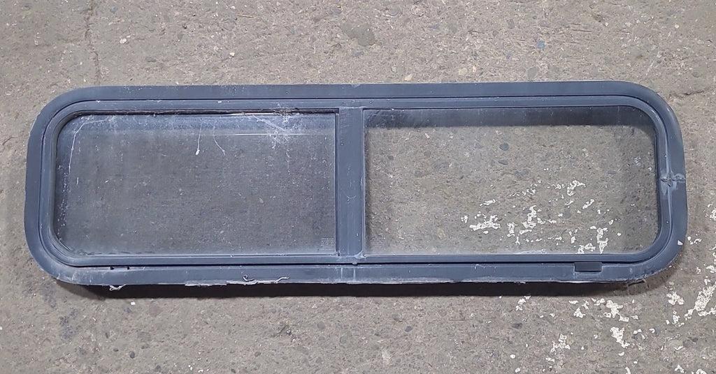 Used Black Radius Opening Window : 42 1/4" W x 11 3/4" H x 1 7/8" D - Young Farts RV Parts