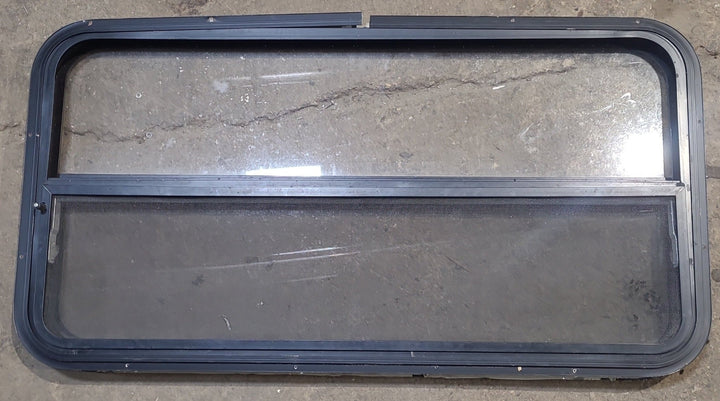 Used Black Radius Opening Window : 42 1/4" W x 22 1/4" H x 1 1/4" D - Young Farts RV Parts