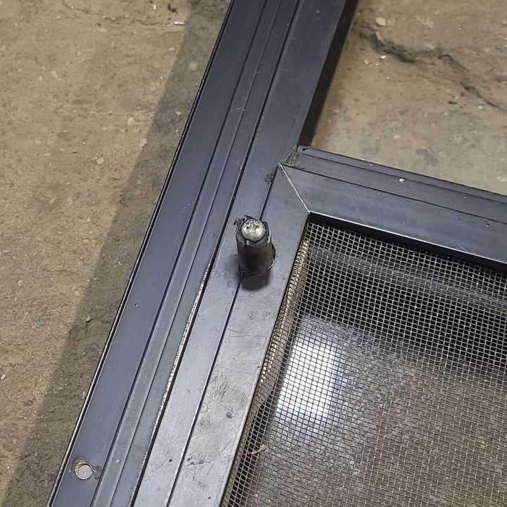 Used Black Radius Opening Window : 42 1/4" W x 22 1/4" H x 1 1/4" D - Young Farts RV Parts