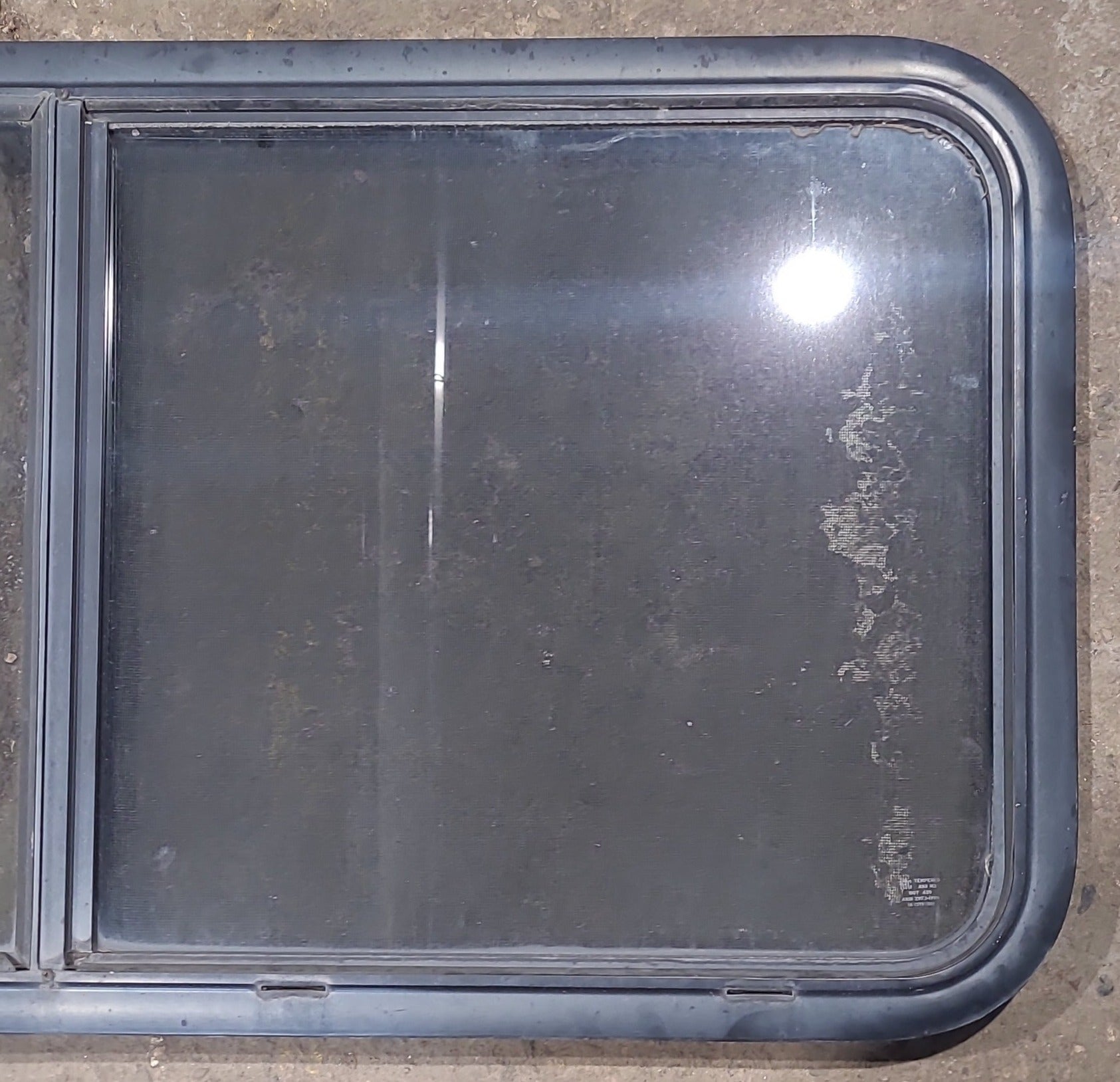 Used Black Radius Opening Window : 45 1/2" W x 21 1/2" H x 1 3/4" D - Young Farts RV Parts