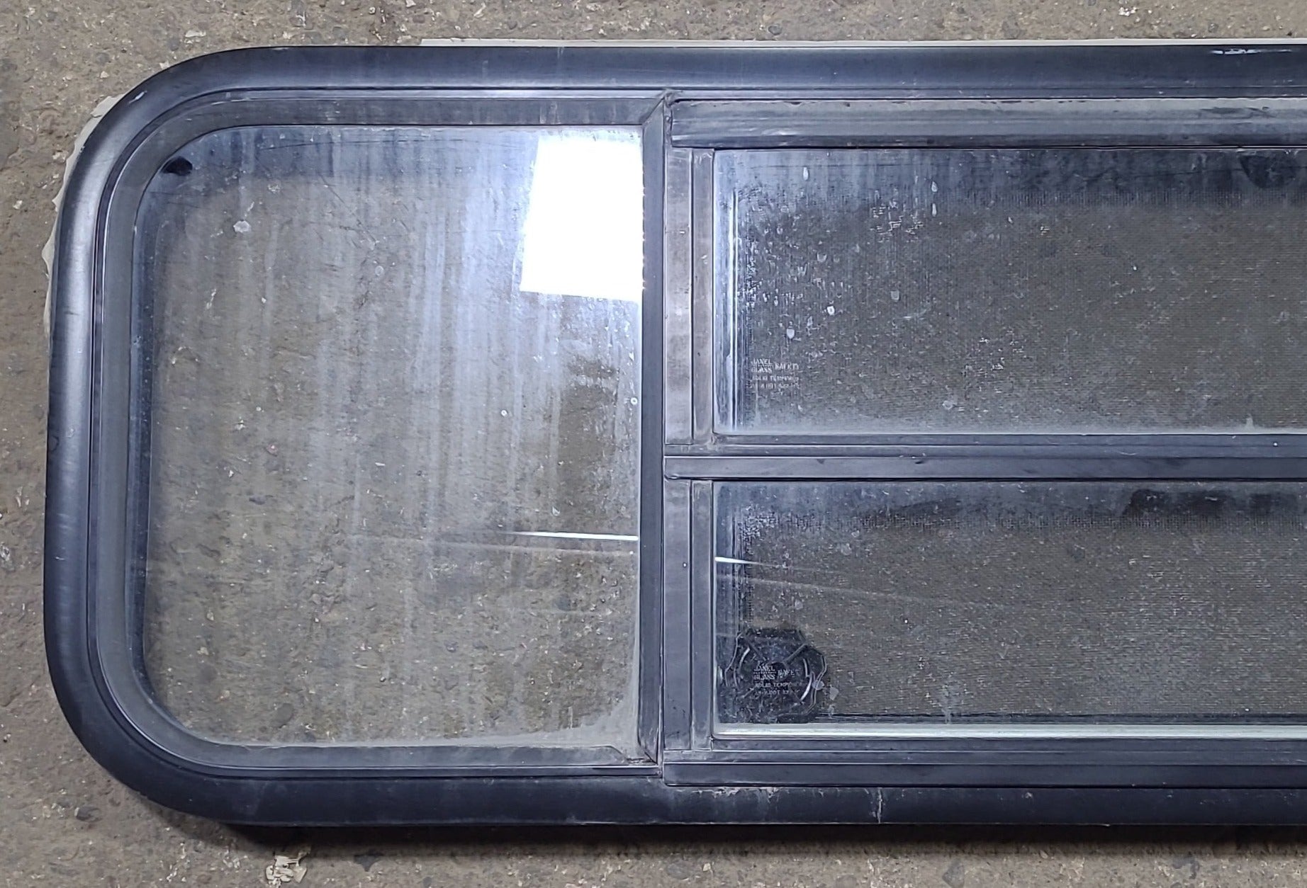 Used Black Radius Opening Window : 47 1/2" W x 14 3/4" H x 1 5/8" D - Young Farts RV Parts