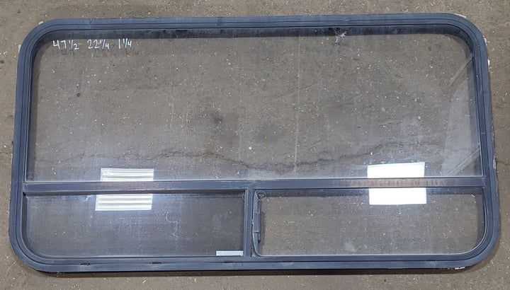 Used Black Radius Opening Window : 47 1/2" W x 22 1/4" H x 1 1/4" D - Young Farts RV Parts