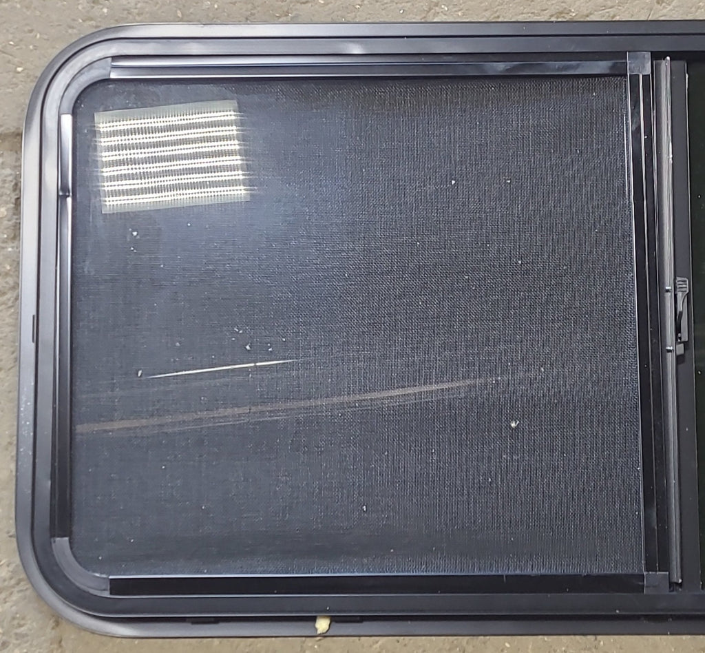 Used Black Radius Opening Window : 47 3/4" W x 21 3/4" H x 1" D - Young Farts RV Parts