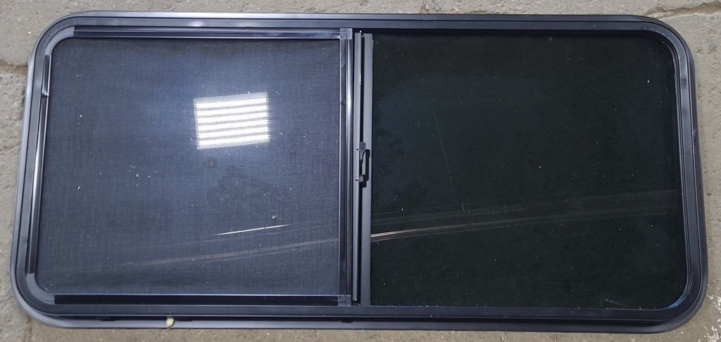 Used Black Radius Opening Window : 47 3/4" W x 21 3/4" H x 1" D - Young Farts RV Parts