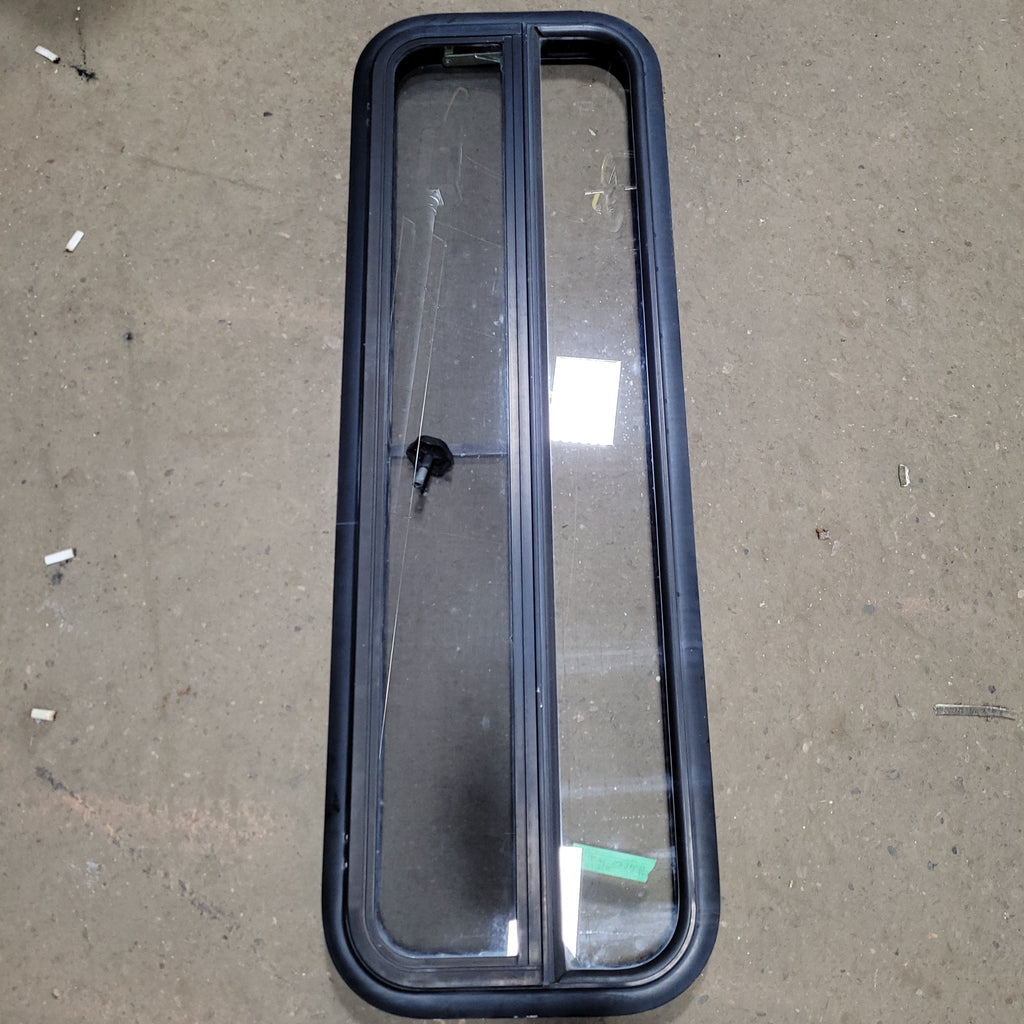 Used Black Radius Opening Window : 48" W X 14" H X 2" D - Young Farts RV Parts
