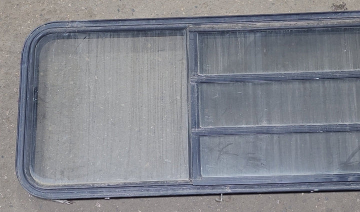 Used Black Radius Opening Window : 71 1/2" W x 21 3/4" H x 1 3/4" D - Young Farts RV Parts