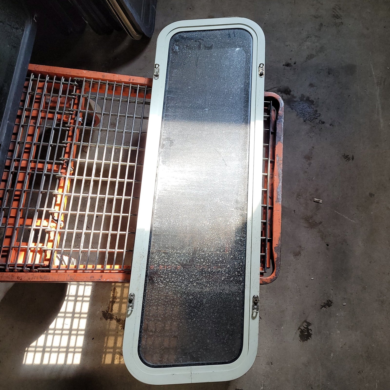 Used Black Radius Slanted Non-Opening Window : 12 X 40 1/2 X 2