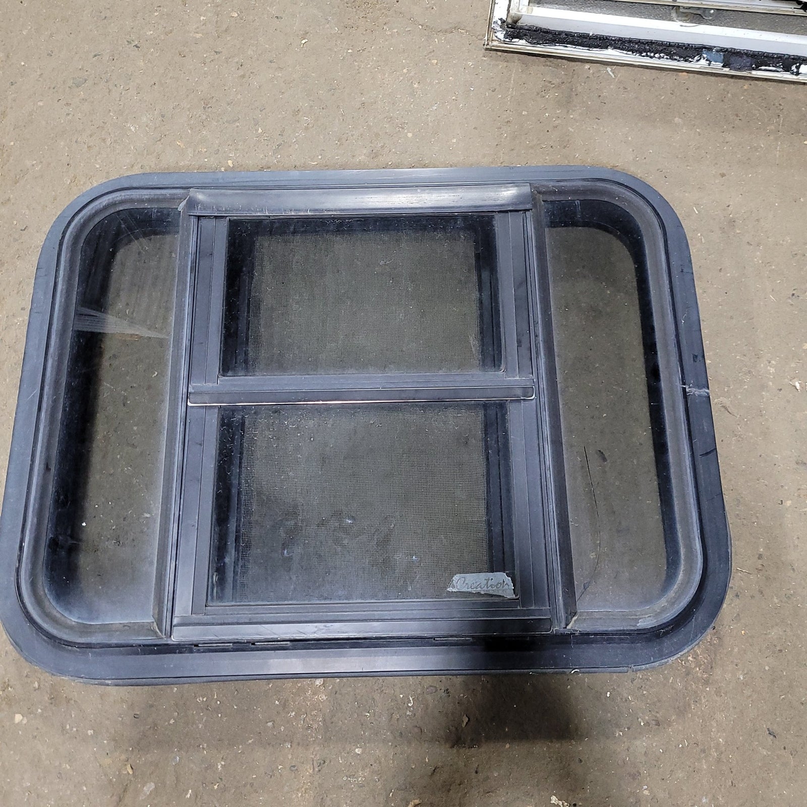 Used Black Radius Slanted Opening Window : 23 1/2