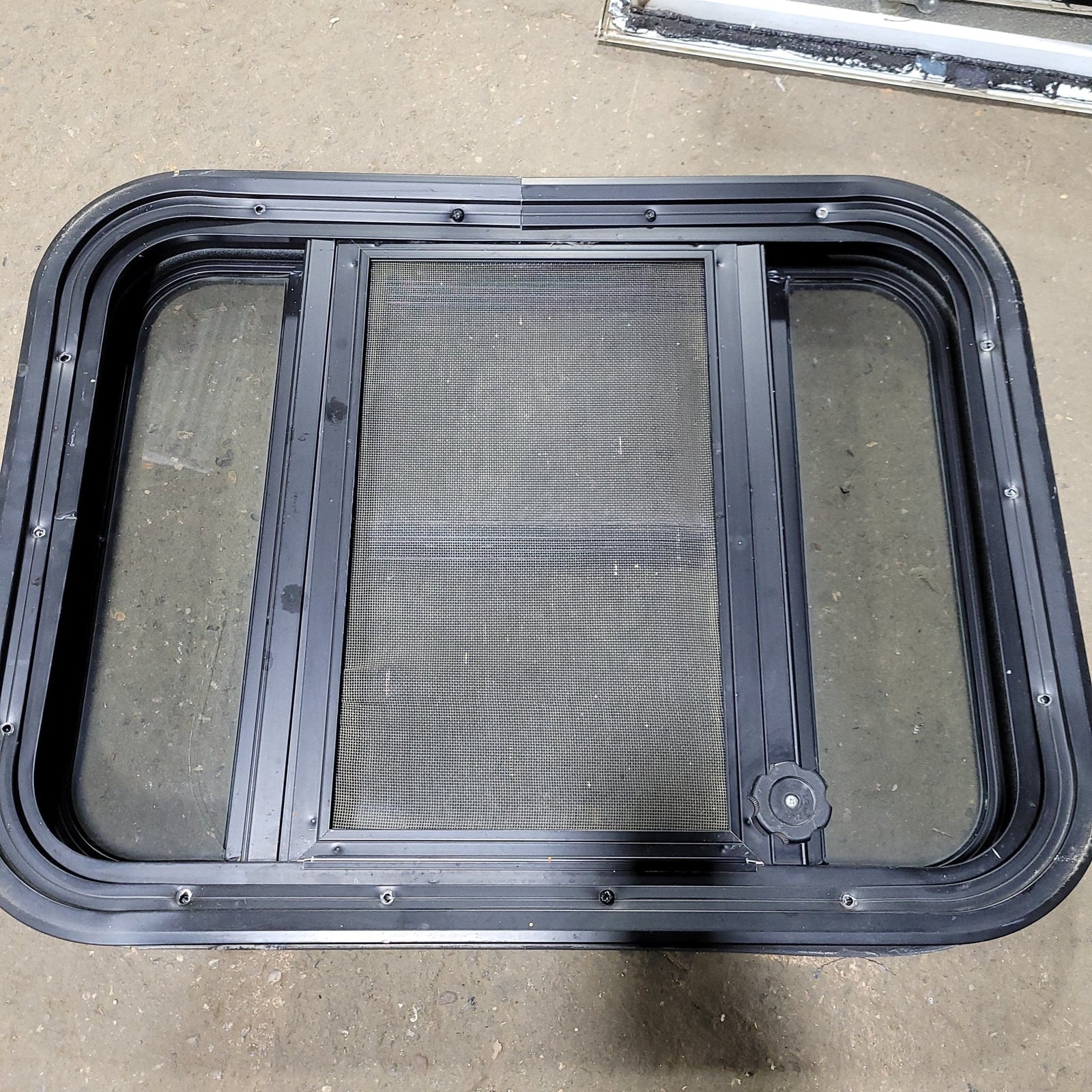 Used Black Radius Slanted Opening Window : 23 1/2