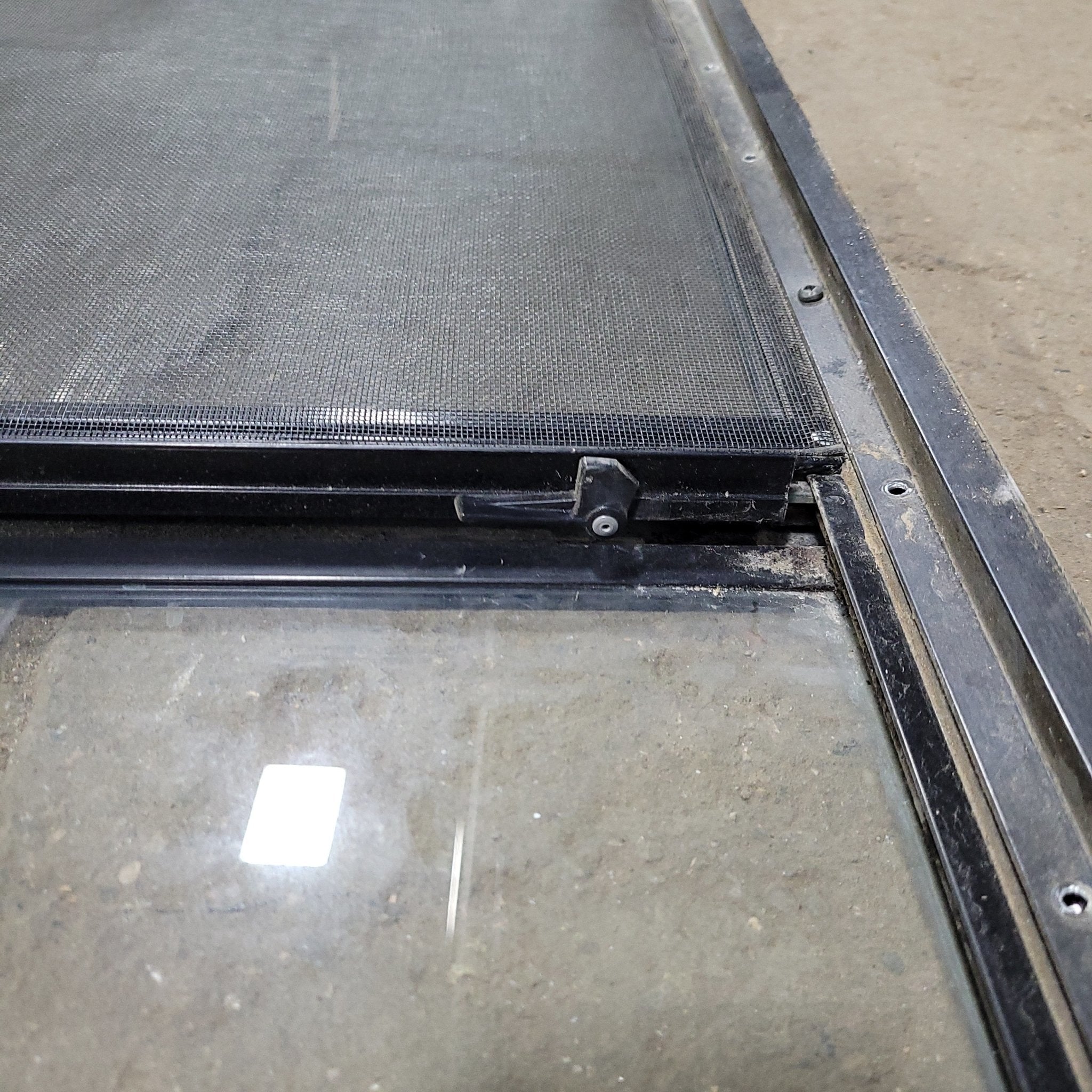 Used Black Radius Slanted Opening Window : Center W 43 1/2"/ Top & Bottom W 42 3/4" X 18" X 1 1/4" D - Young Farts RV Parts