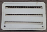 Used DOMETIC 3109350.011 - Yellowed Air Intake Side Refrigerator Vent- HAS FRAME
