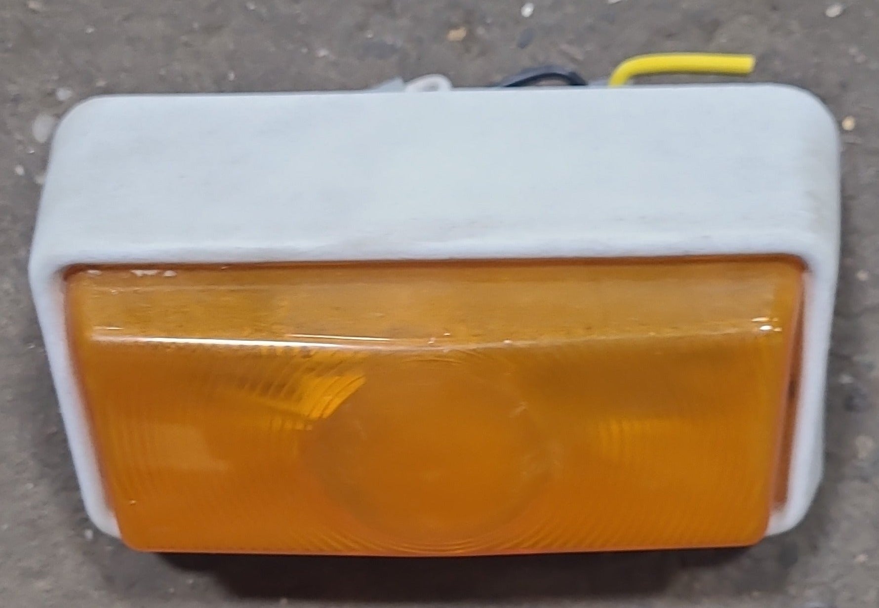 Used Porch Light Amber 5 7/8" X 3 1/2" - Young Farts RV Parts