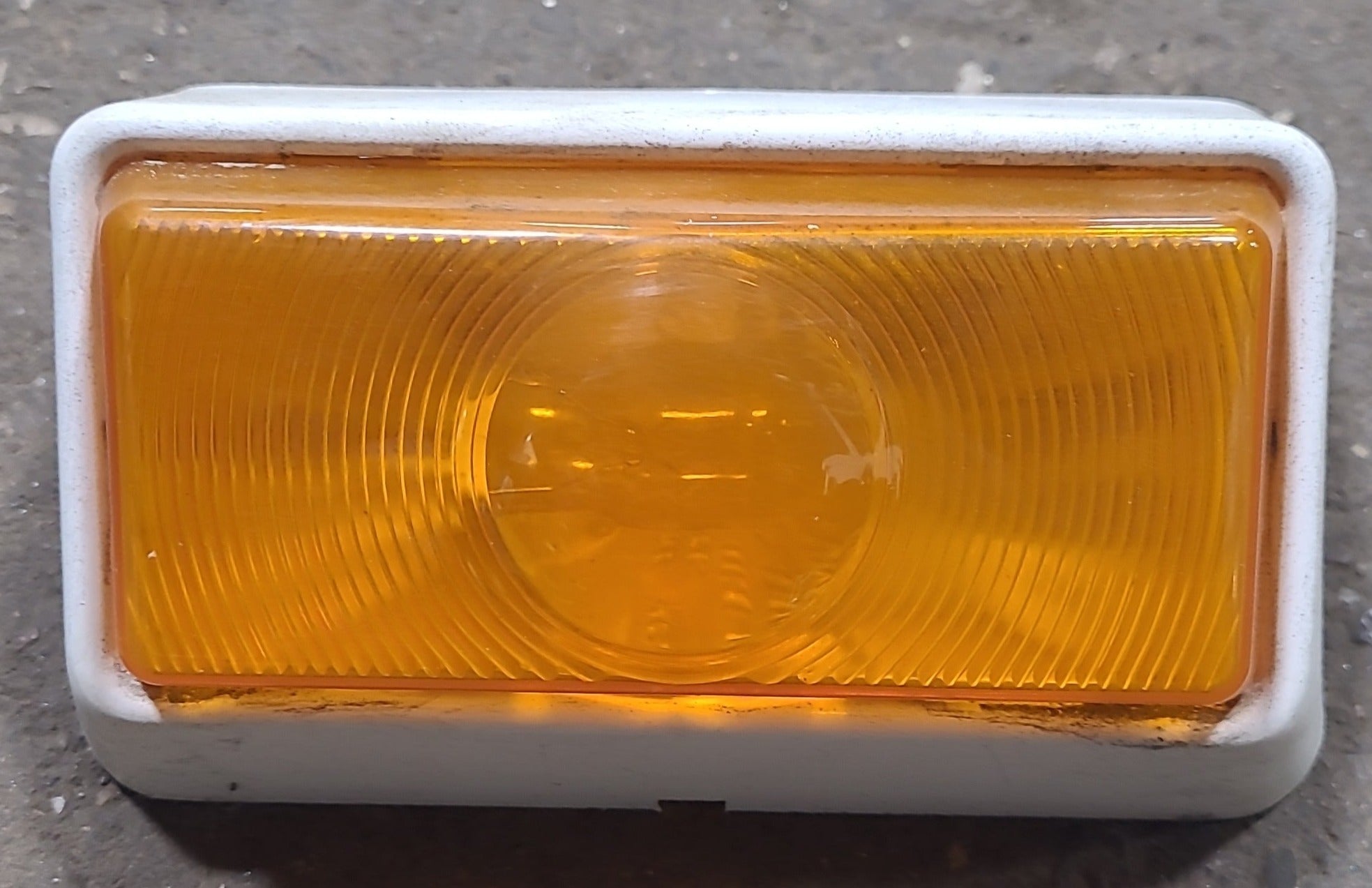 Used Porch Light Amber 5 7/8" X 3 1/2" - Young Farts RV Parts